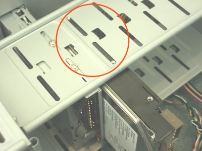 Lining up the hard disk screws, you need two per side for stability!